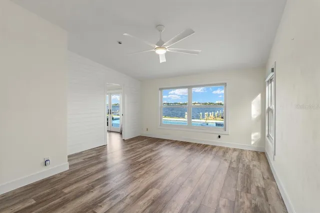 a bathroom with a granite countertop sink mirror and double