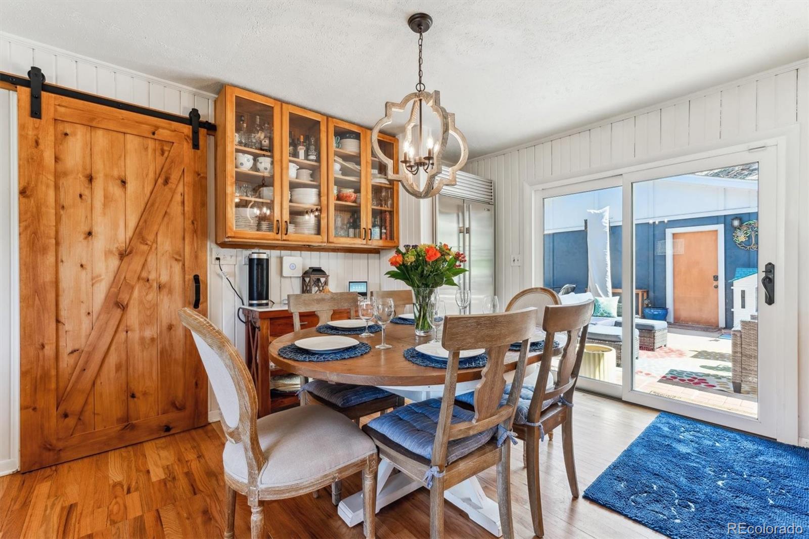 5384 Olde Stage Road Boulder, CO 80302 - Photo 26 of 49 a view of a dining room with furniture window and wooden floor