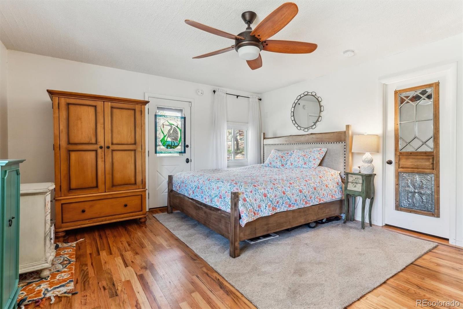 5384 Olde Stage Road Boulder, CO 80302 - Photo 28 of 49 a bedroom with a bed and a large window