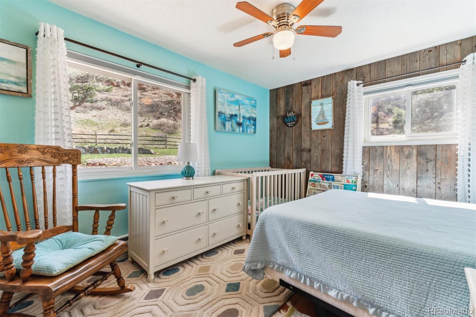 5384 Olde Stage Road Boulder, CO 80302 - Photo 33 of 49 a bedroom with a bed and a window