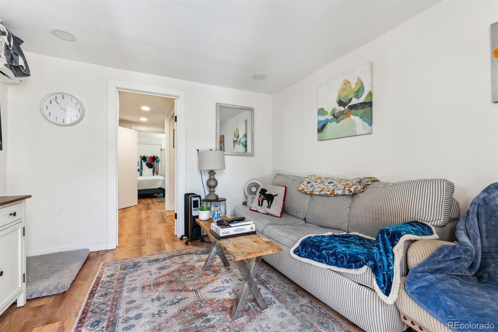 5384 Olde Stage Road Boulder, CO 80302 - Photo 40 of 49 a living room with furniture and a rug