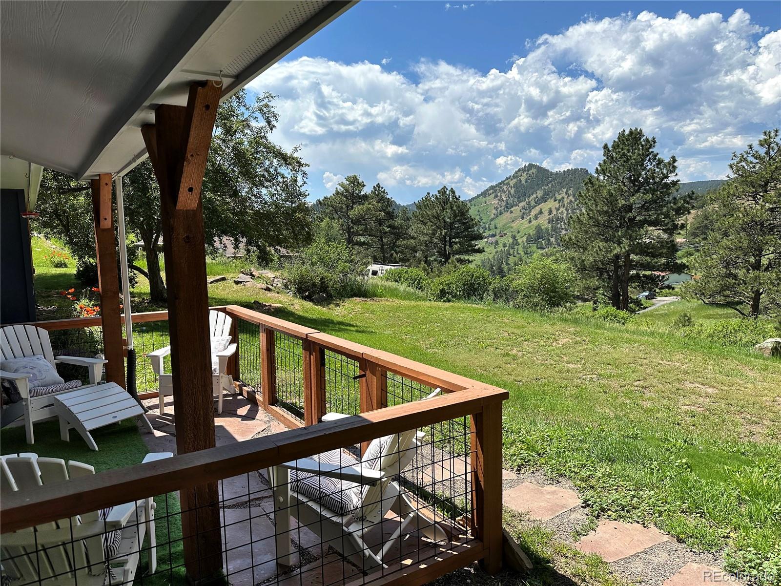 5384 Olde Stage Road Boulder, CO 80302 - Photo 4 of 49 a view of a balcony with mountain