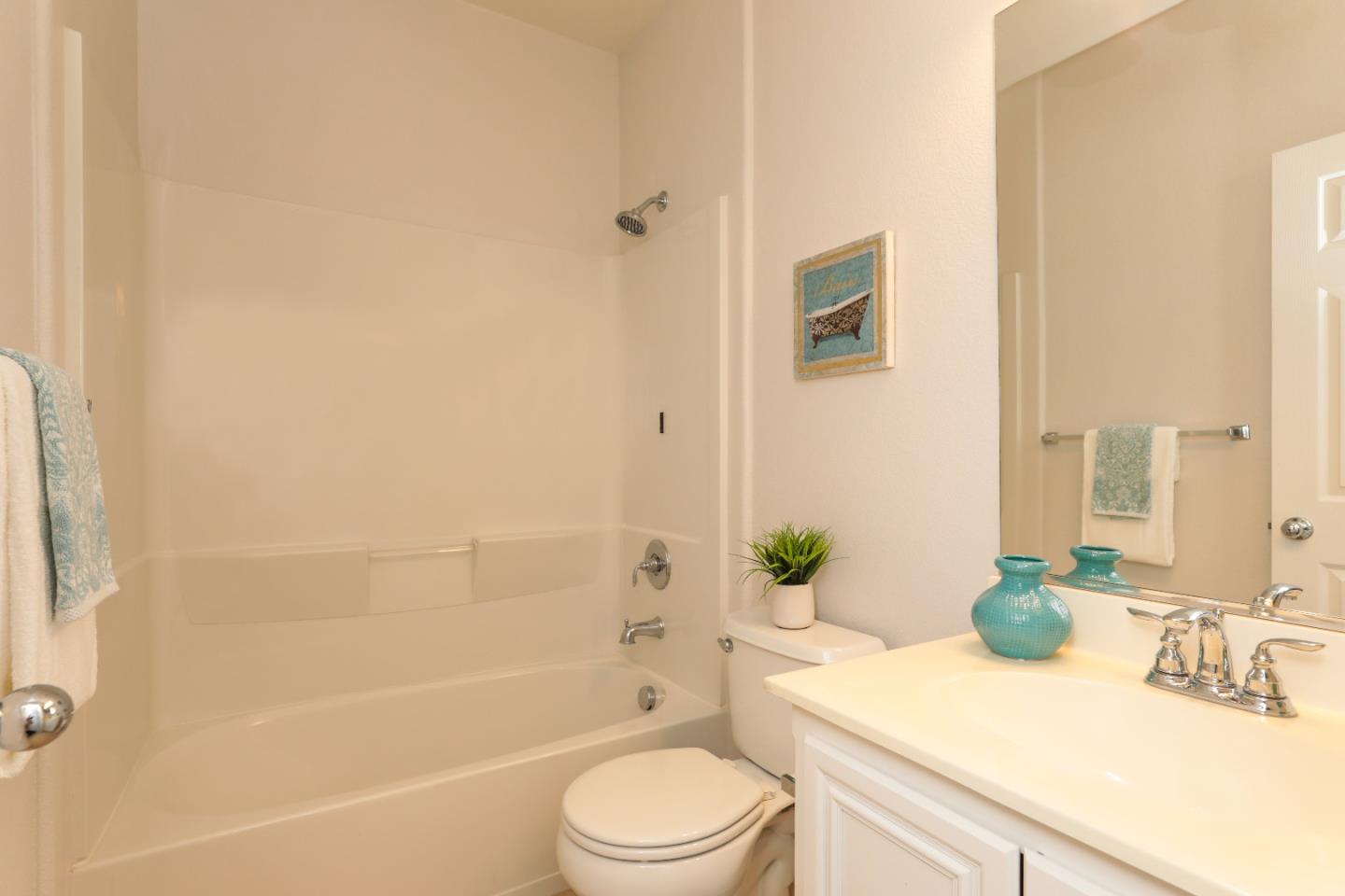 1756 Snell Place Milpitas, CA 95035 - Photo 16 of 22 a bathroom with a sink a toilet and shower