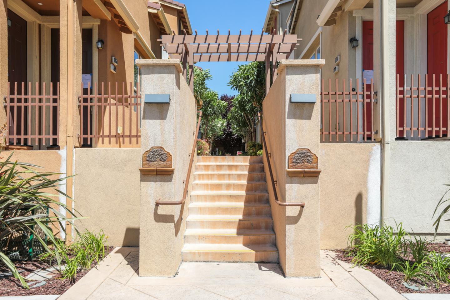 1756 Snell Place Milpitas, CA 95035 - Photo 18 of 22 a front view of a house with a garden
