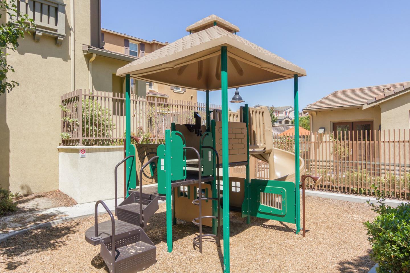 1756 Snell Place Milpitas, CA 95035 - Photo 19 of 22 a view of a chair and table in the patio