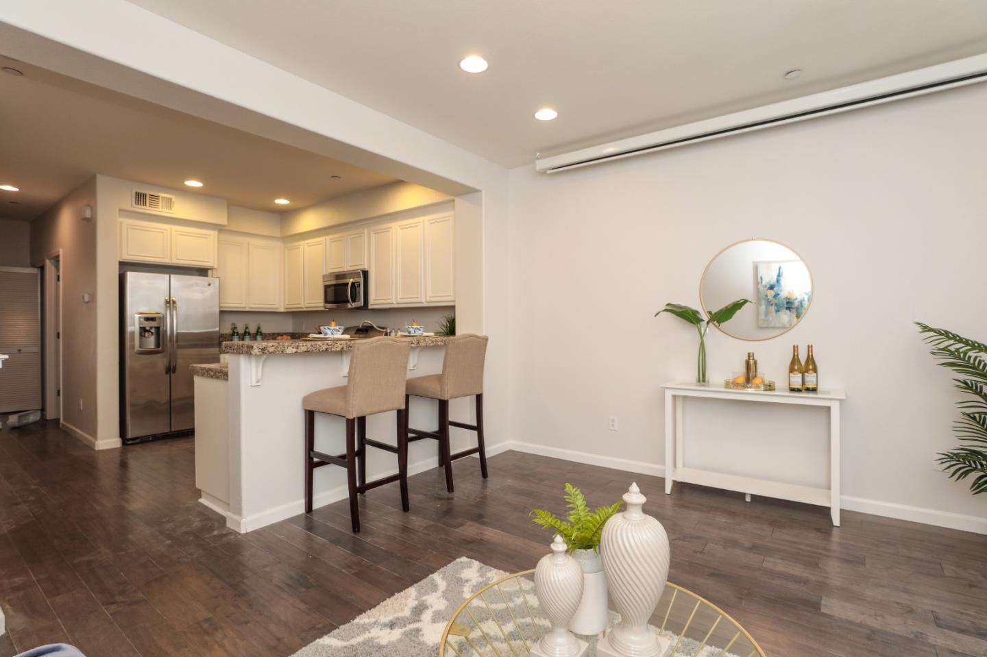 1756 Snell Place Milpitas, CA 95035 - Photo 2 of 22 a kitchen with a sink appliances and dining table