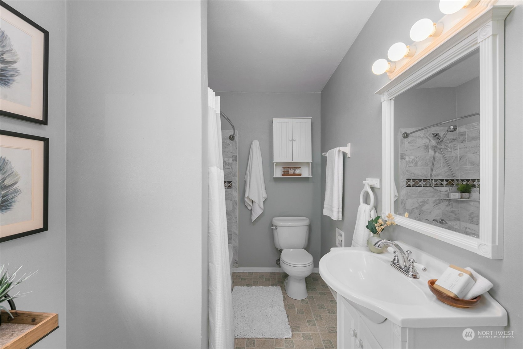 8123 28th Avenue Southwest Seattle, WA 98126 - Photo 19 of 31 a bathroom with a sink toilet and shower