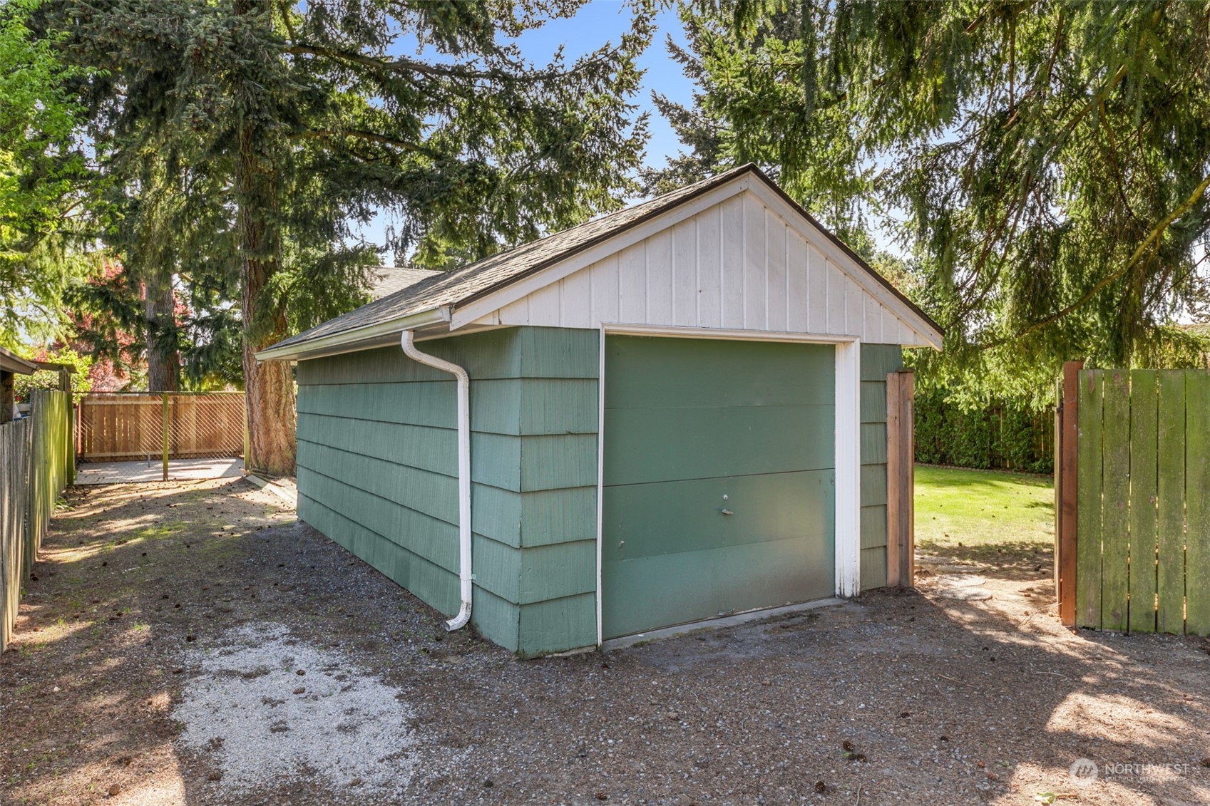 8123 28th Avenue Southwest Seattle, WA 98126 - Photo 27 of 31 a view of a house with a yard