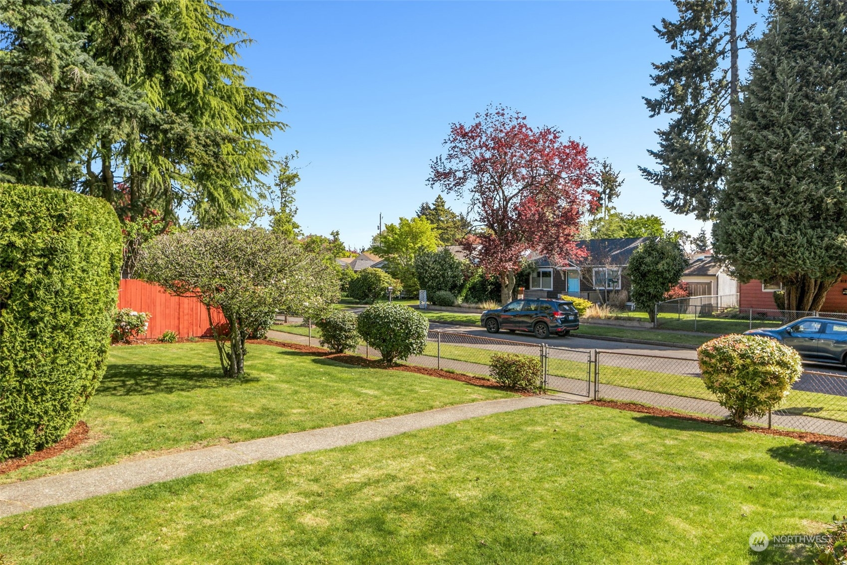 8123 28th Avenue Southwest Seattle, WA 98126 - Photo 29 of 31 a view of a bench in a yard