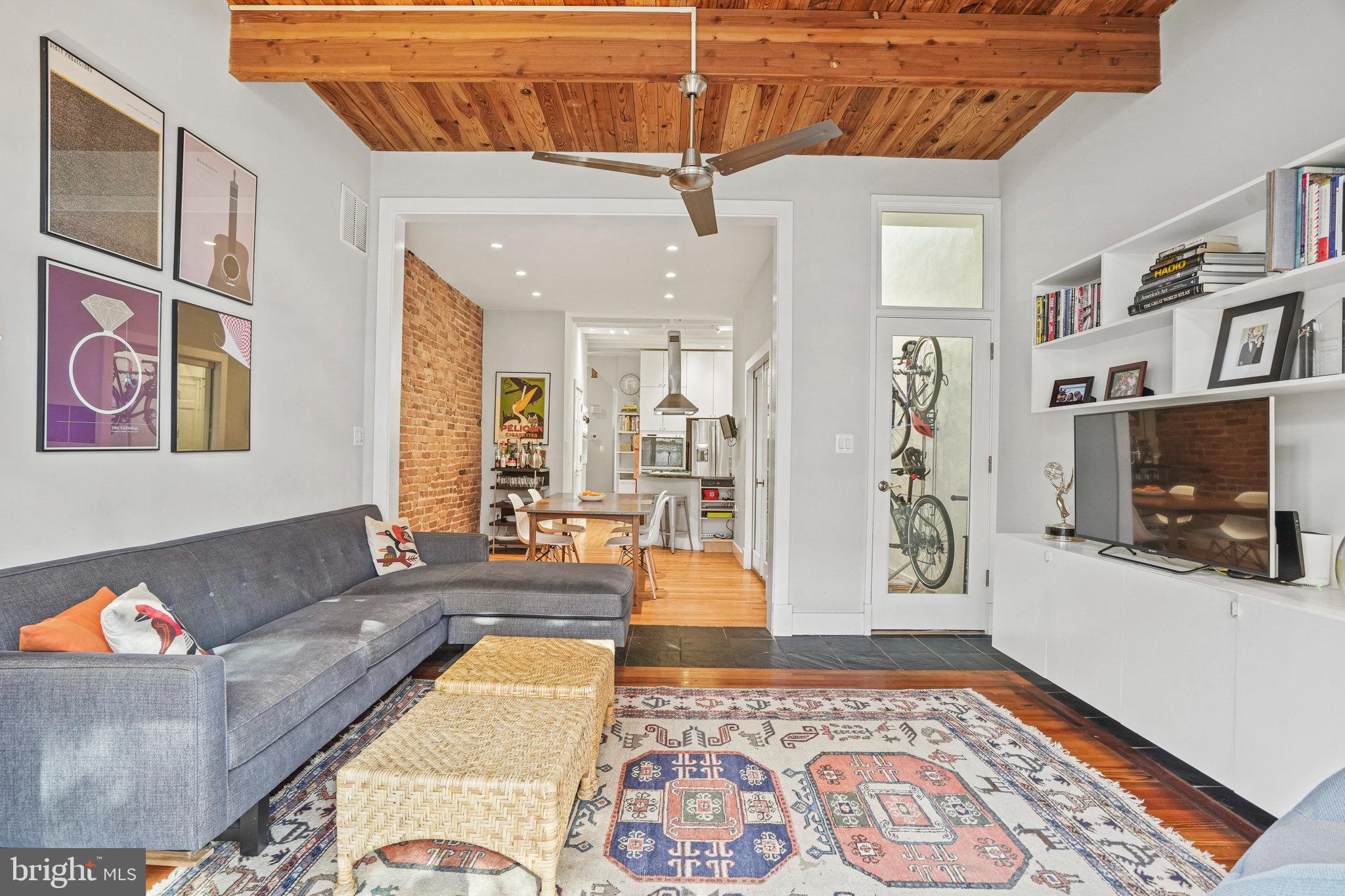 1217 E Street Northeast Washington, DC 20002 - Photo 14 of 46 FamRm, to dining rm. to kitchen. Skylit nook at rt
