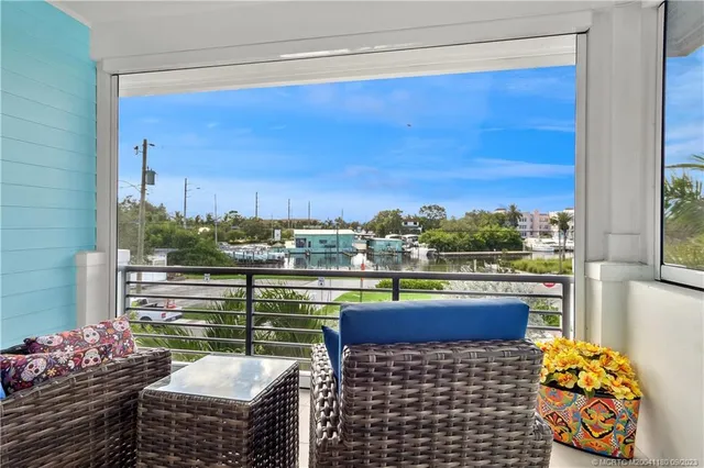 a balcony with furniture and city view