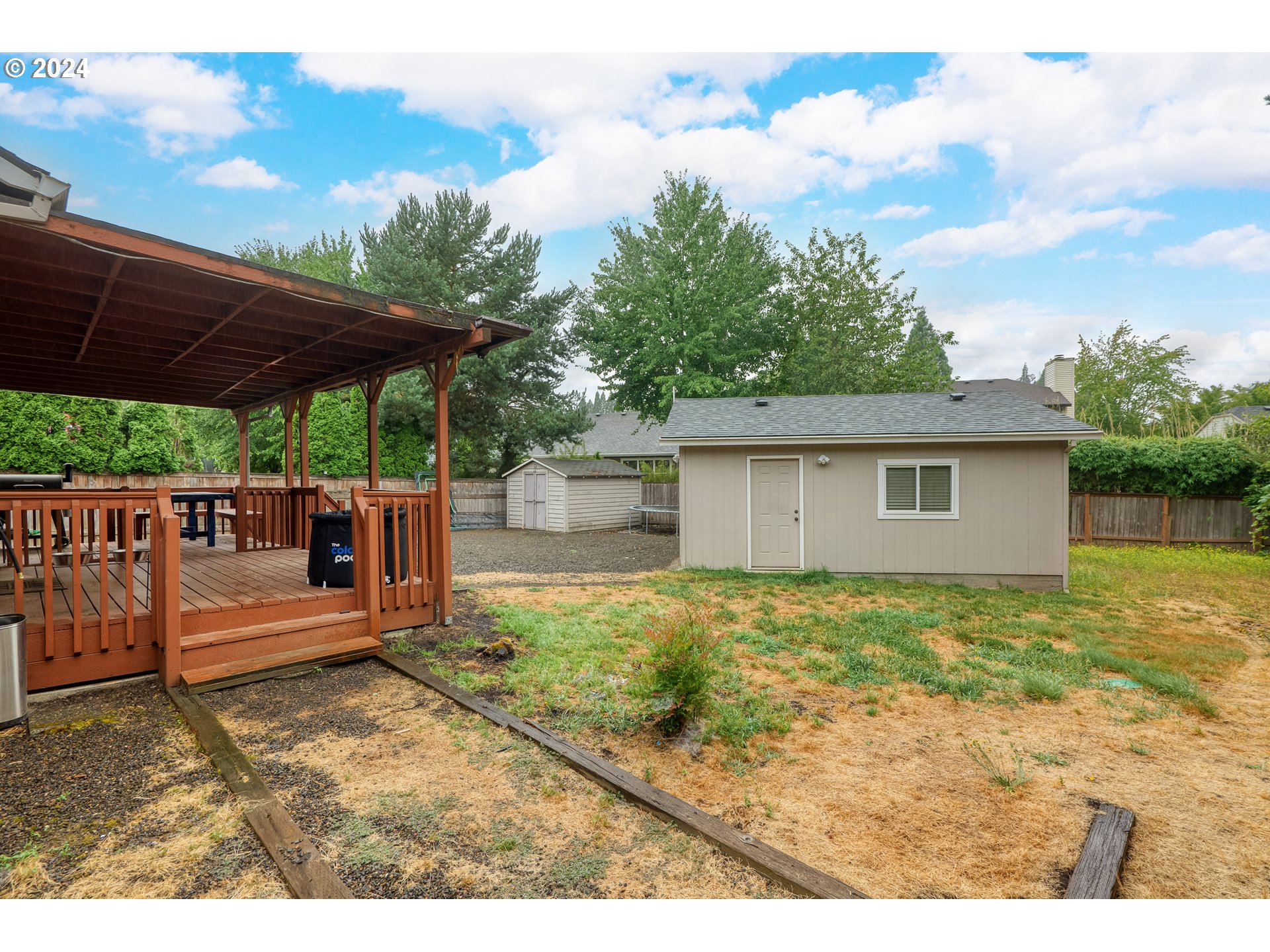 216 Southwest Sutherland Way Beaverton, OR 97006 - Photo 18 of 19 a view of a backyard