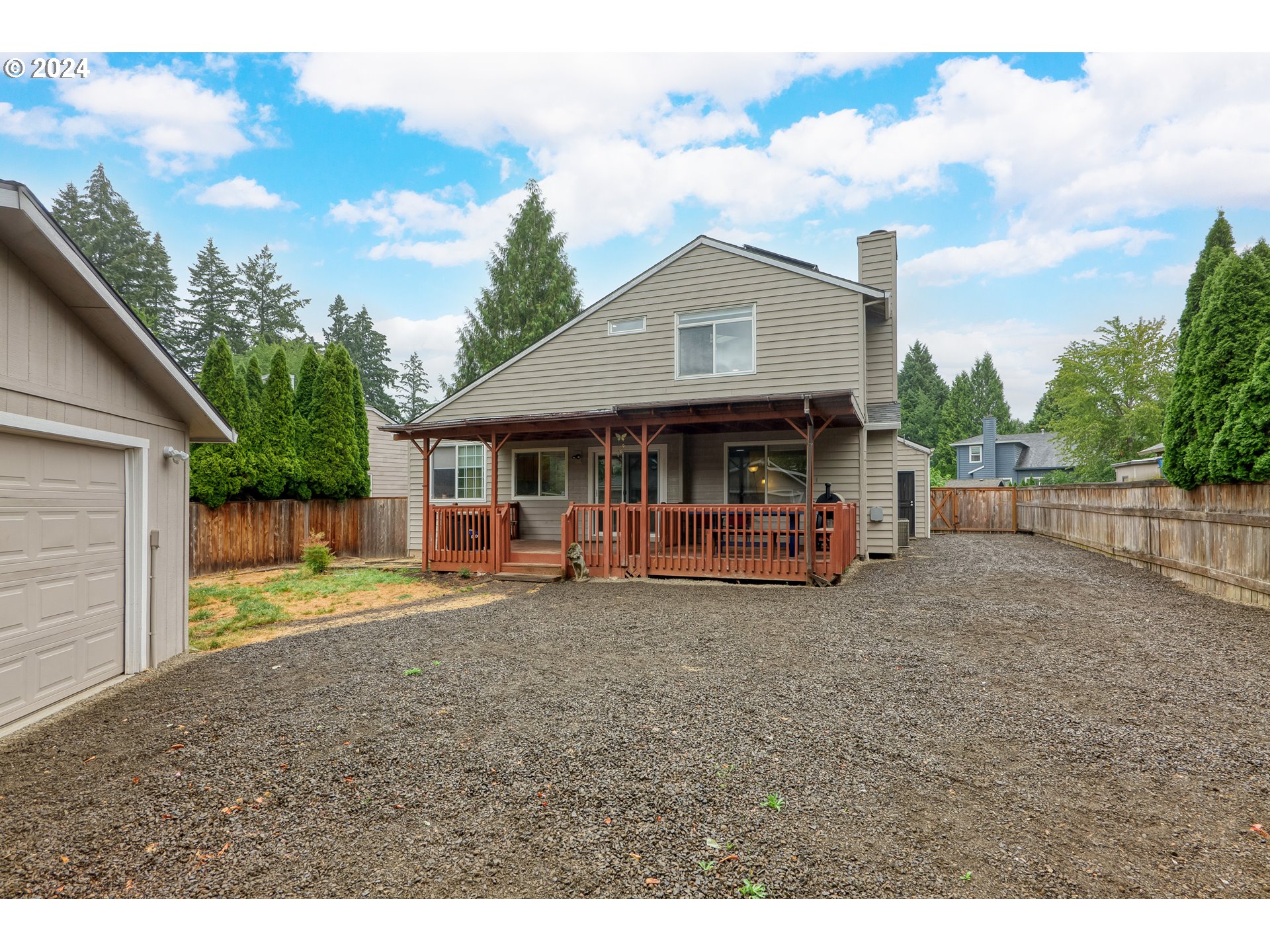 216 Southwest Sutherland Way Beaverton, OR 97006 - Photo 19 of 19 a view of a house with backyard and sitting area