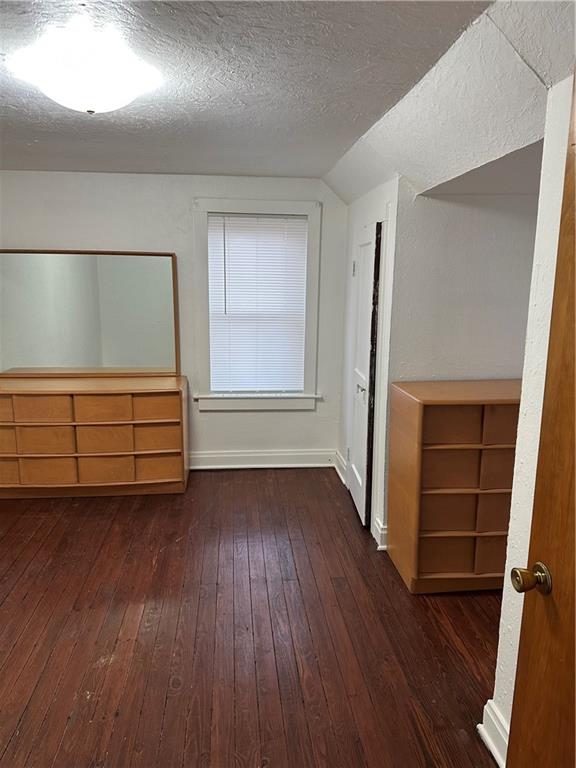 1431 Hooker Road Karns City, PA 16041 - Photo 11 of 18 an empty room with wooden floor and closet