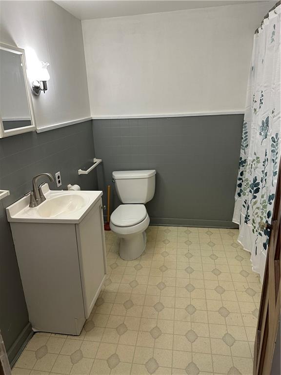 1431 Hooker Road Karns City, PA 16041 - Photo 12 of 18 a bathroom with a sink and a toilet