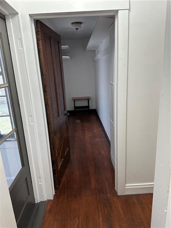1431 Hooker Road Karns City, PA 16041 - Photo 15 of 18 a view of a hallway with wooden floor and stairs