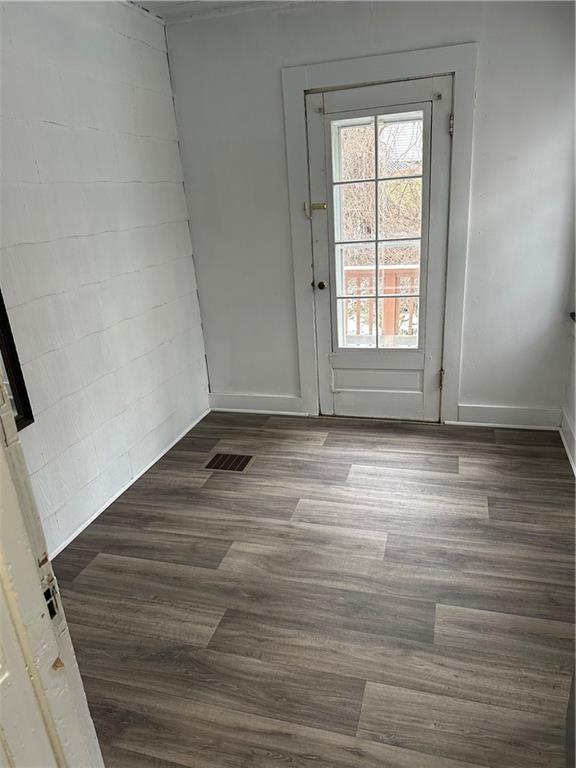 1431 Hooker Road Karns City, PA 16041 - Photo 5 of 18 a view of empty room with wooden floor and fan