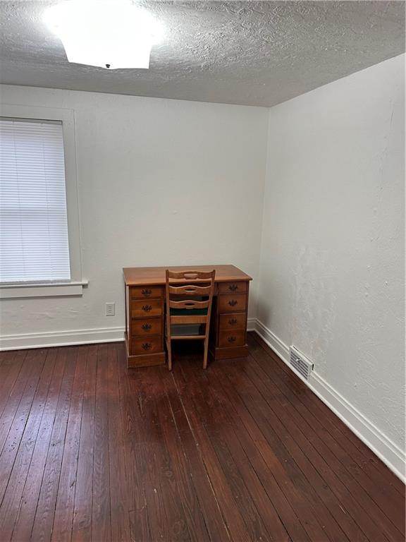 1431 Hooker Road Karns City, PA 16041 - Photo 9 of 18 a view of a room with wooden floor and lounge chairs