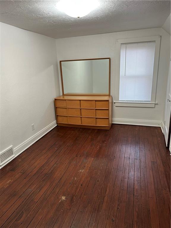 1431 Hooker Road Karns City, PA 16041 - Photo 10 of 18 a view of room with wooden floor and window