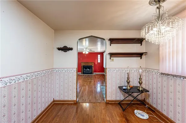 a view of entryway with wooden floor