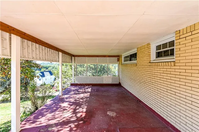 a view of a back yard with green space