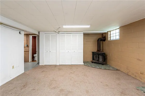 a view of a room with a flat screen tv