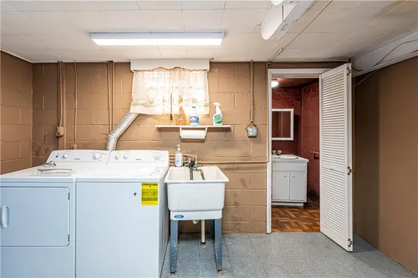 a bathroom with a sink and a toilet