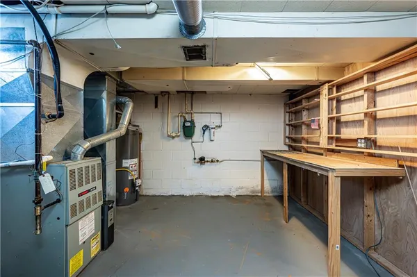 a view of entryway with wooden walls