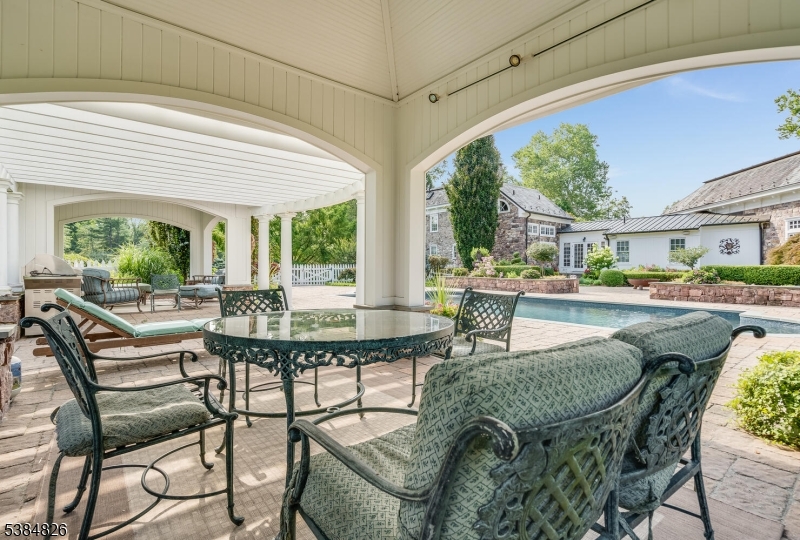 312 Hamden Road Annandale, NJ 08801 - Photo 13 of 50 a outdoor space with patio the couches and pool