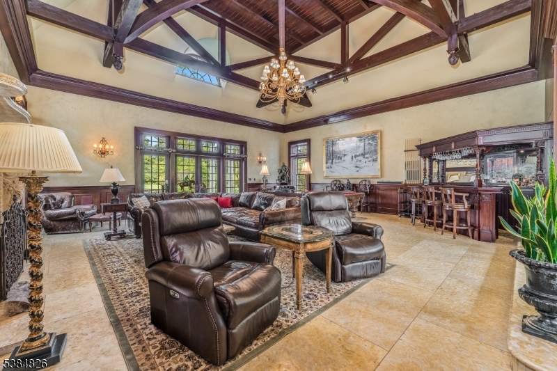 312 Hamden Road Annandale, NJ 08801 - Photo 20 of 50 a living room with lots of furniture and a chandelier