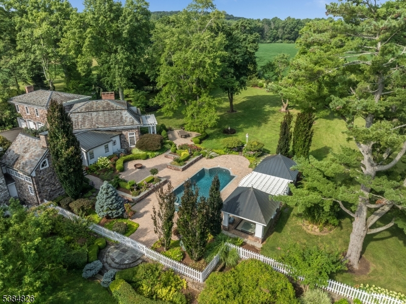 312 Hamden Road Annandale, NJ 08801 - Photo 3 of 50 an aerial view of multiple houses with yard