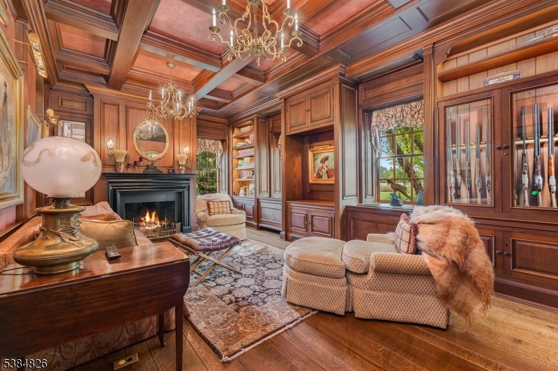 312 Hamden Road Annandale, NJ 08801 - Photo 32 of 50 a living room with furniture fireplace and flat screen tv