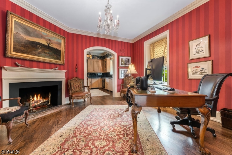 312 Hamden Road Annandale, NJ 08801 - Photo 38 of 50 a living room with furniture a table and a fireplace