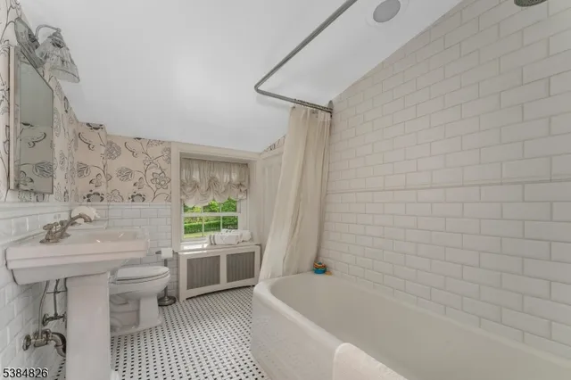 a view of balcony with furniture