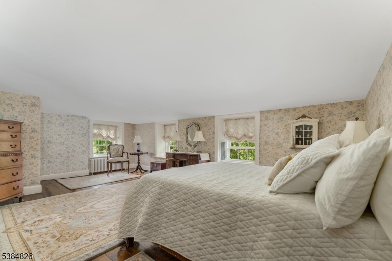 312 Hamden Road Annandale, NJ 08801 - Photo 43 of 50 a bed room with a bed and a chair