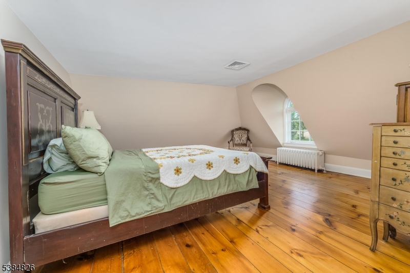 312 Hamden Road Annandale, NJ 08801 - Photo 45 of 50 a bedroom with a bed and window
