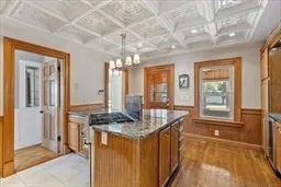 a kitchen that has a lot of cabinets in it
