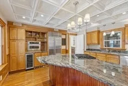 a kitchen with stainless steel appliances granite countertop a sink and cabinets