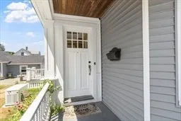 a view of a balcony with wooden floor