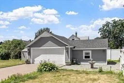 a front view of a house with seating space