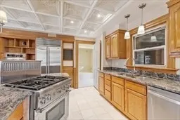 a kitchen with stainless steel appliances granite countertop a stove and a sink