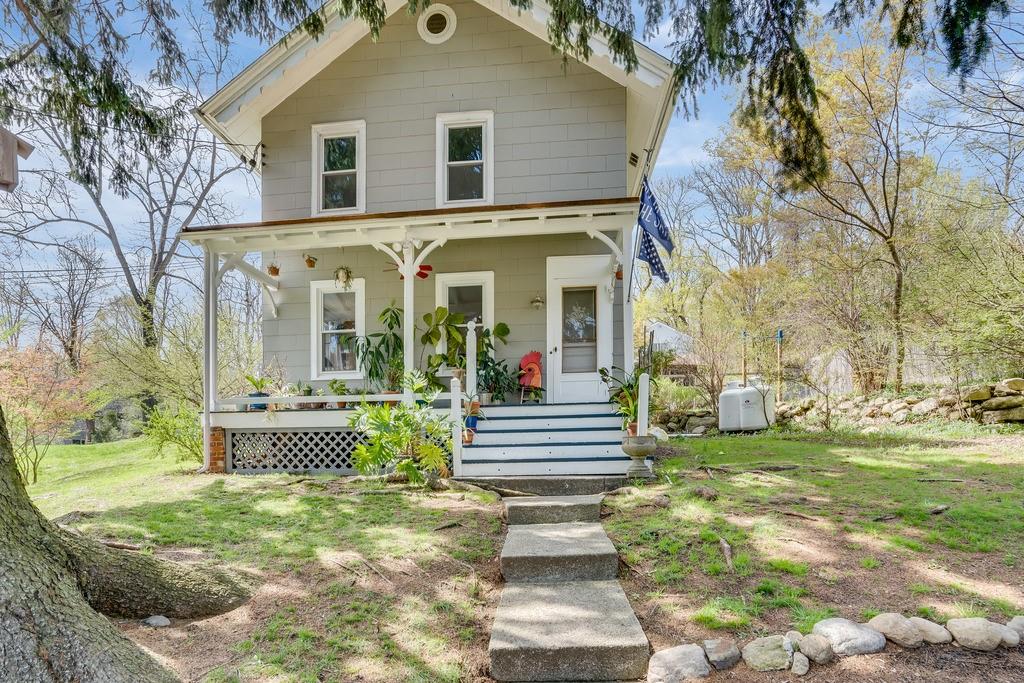 4 Fishkill Road Cold Spring, NY 10516 - Photo 1 of 1 a view of a house with backyard and a garden