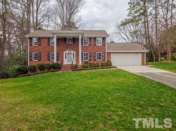 2205 Barfield Court Raleigh, NC 27612 - Photo 1 of 30 a front view of house with yard and green space