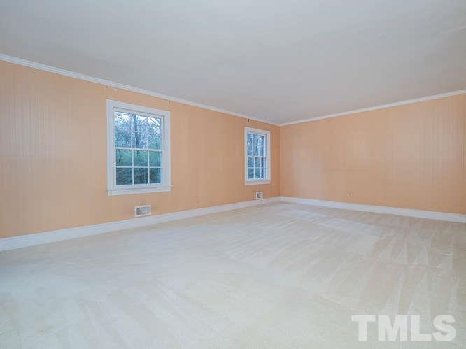 2205 Barfield Court Raleigh, NC 27612 - Photo 19 of 30 an empty room with windows