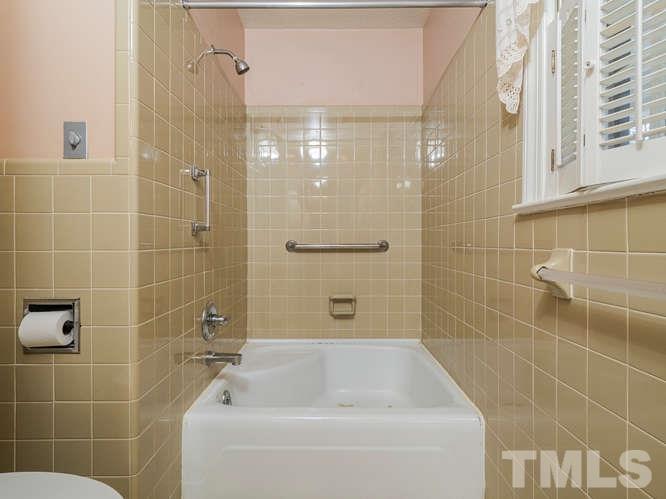 2205 Barfield Court Raleigh, NC 27612 - Photo 26 of 30 a bathroom with a shower and a bathtub