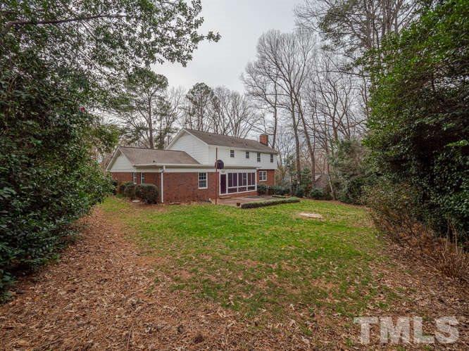 2205 Barfield Court Raleigh, NC 27612 - Photo 30 of 30 a view of a house with a yard