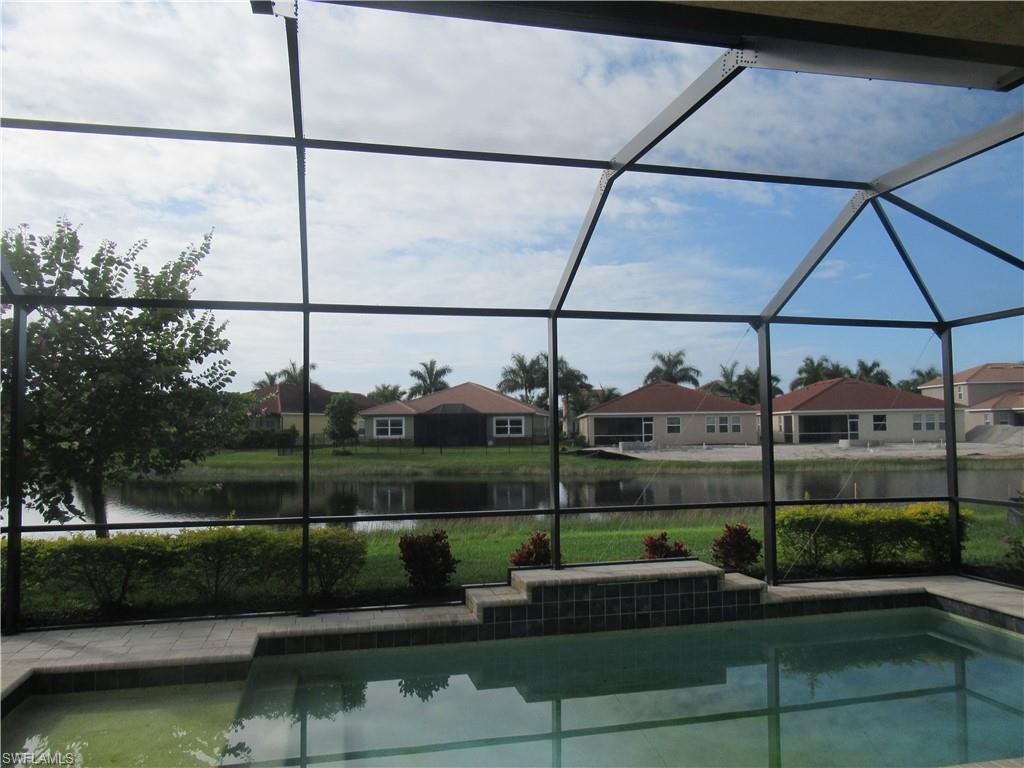 4114 Dutchess Park Road Fort Myers, FL 33916 - Photo 2 of 15 a view of yard from a balcony