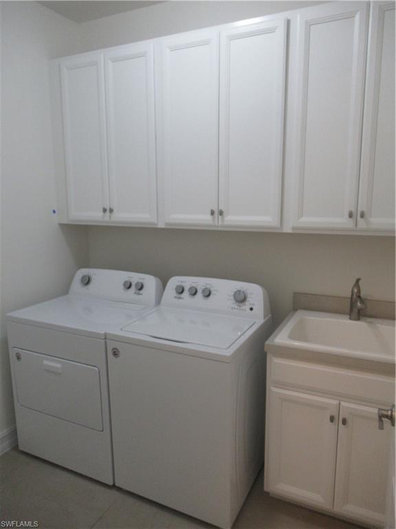 4114 Dutchess Park Road Fort Myers, FL 33916 - Photo 9 of 15 a utility room with dryer and washer