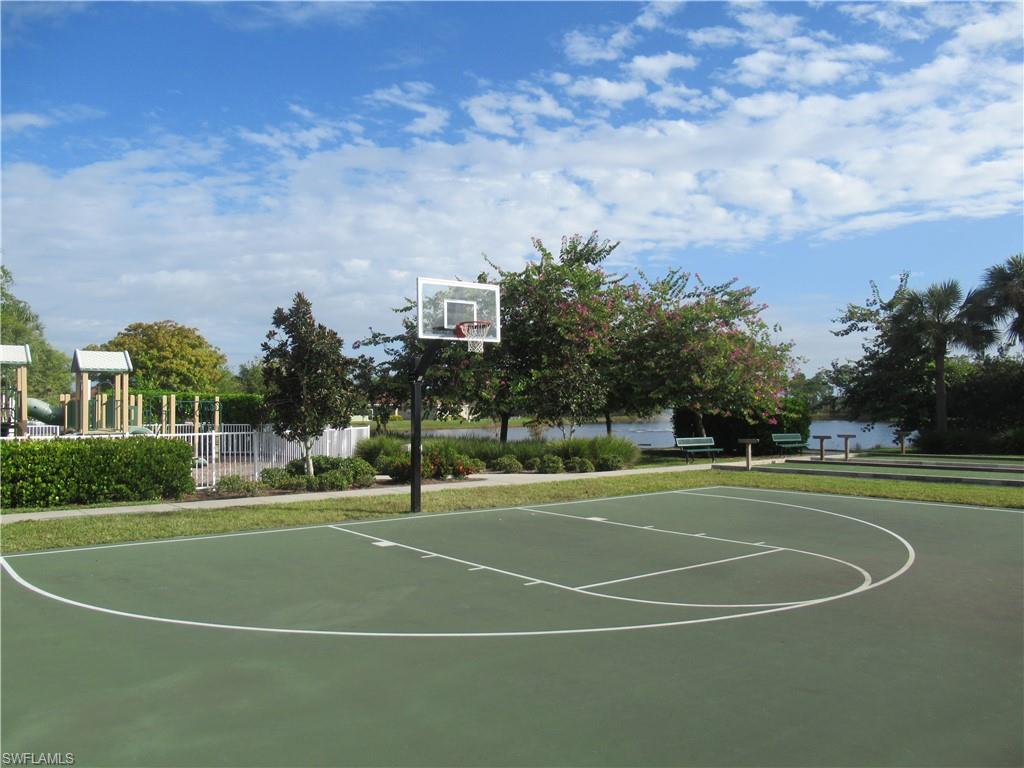 4114 Dutchess Park Road Fort Myers, FL 33916 - Photo 10 of 15 a view of a tennis ground with large trees