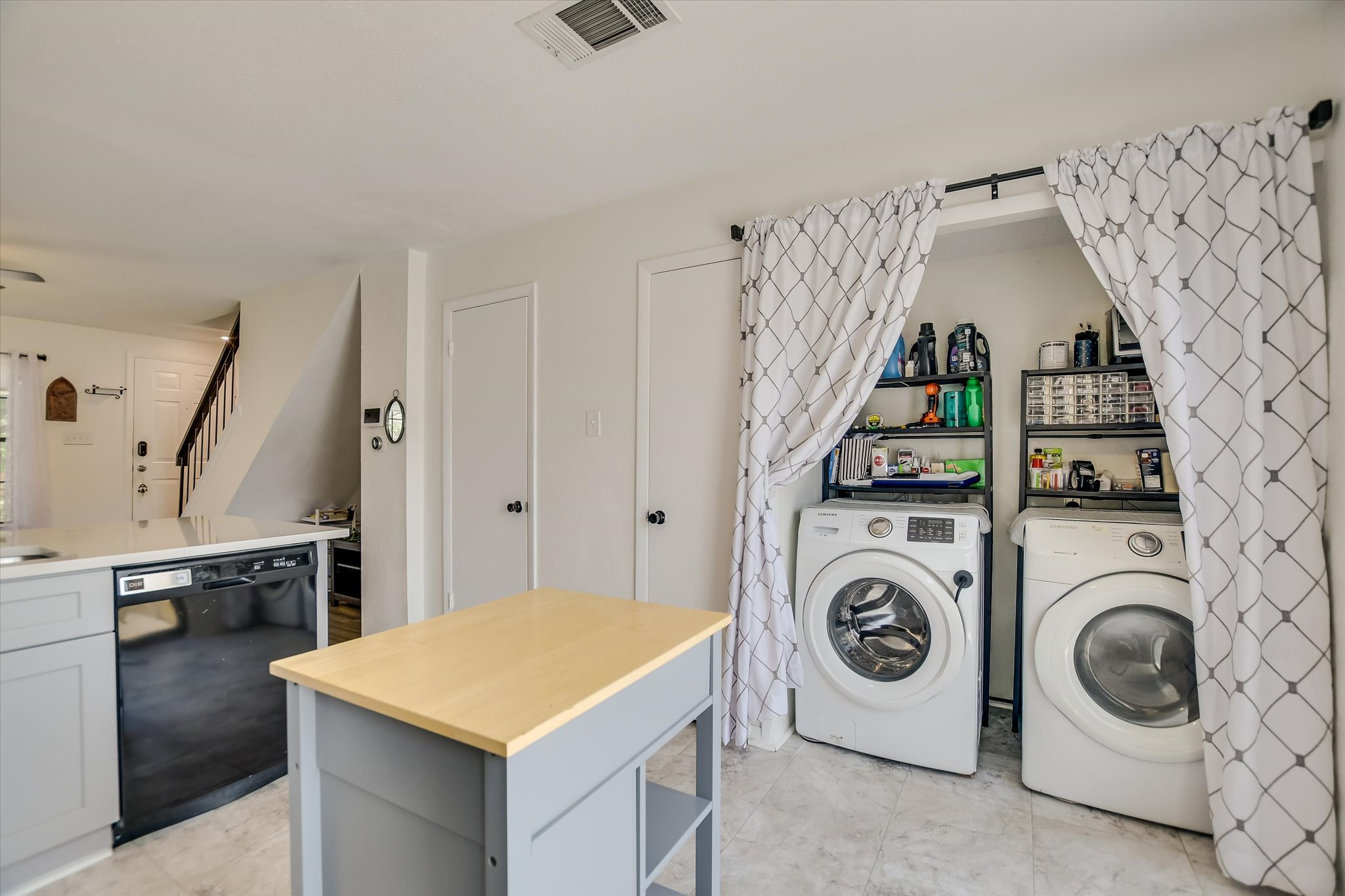 11901 Swearingen Drive, Unit 4 Austin, TX 78758 - Photo 7 of 23 a utility room with dryer and washer